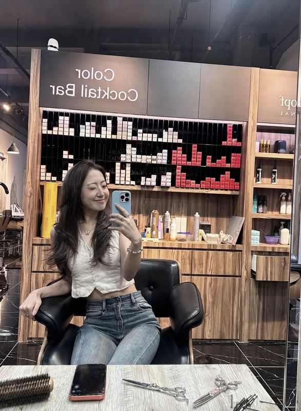Happy client with fresh hair colour at Bazaar Hair Salon Geylang